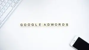 Scrabble letter spelling "Google Adwords"