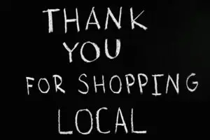 "Thank for shopping local" sign