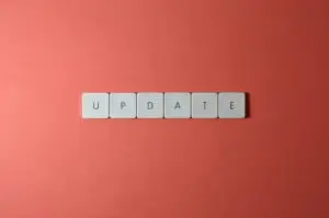 The word "update" written with Scrabble letters.