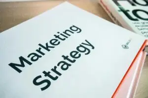 Image of piece of paper showing the words "Marketing Strategy"