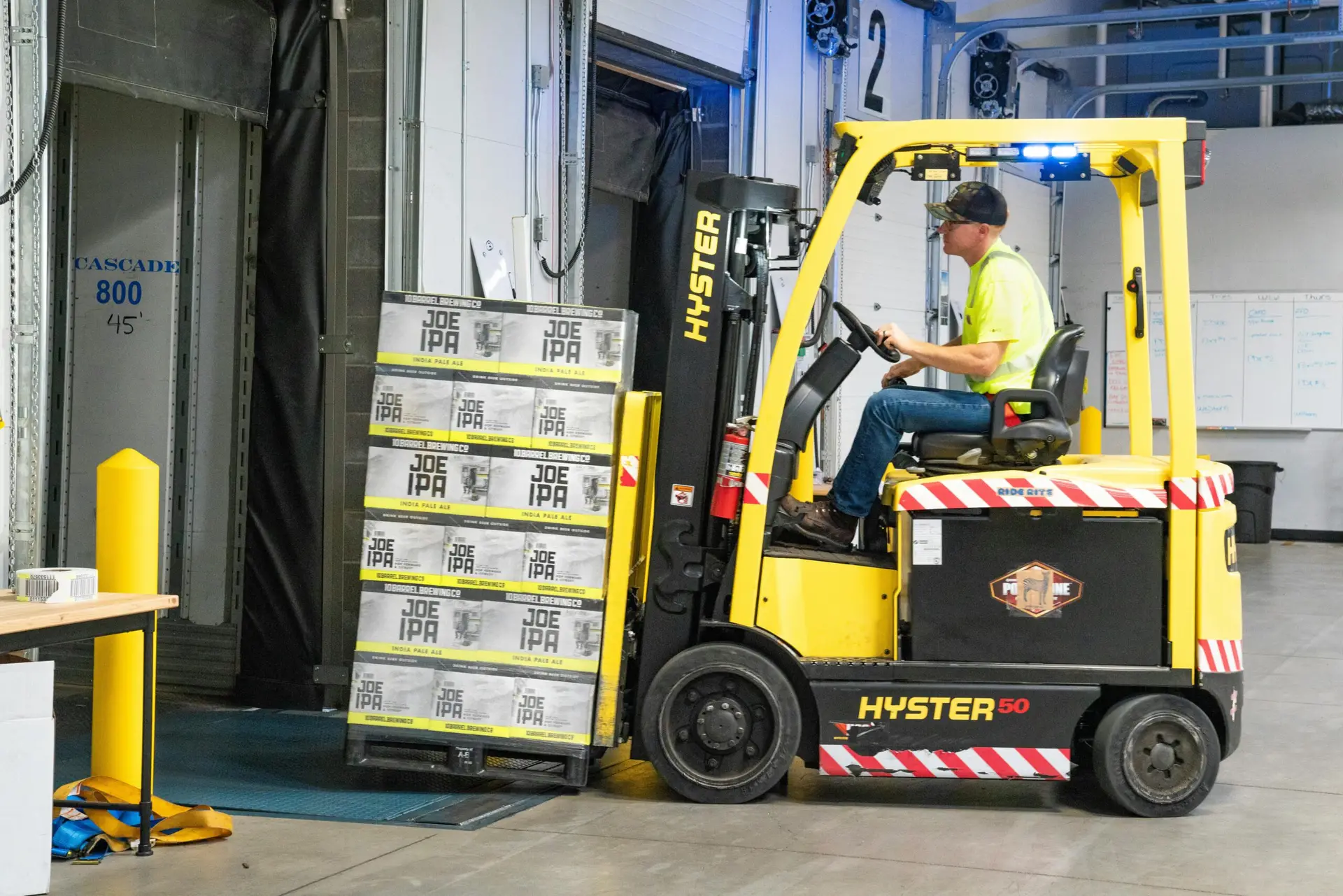 Forklift Driver Loading a Trailer